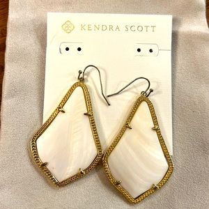Kendra Scott drop earrings in white and gold